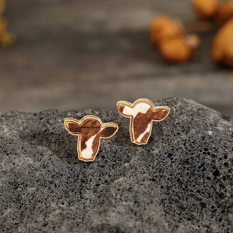 Retro western oorbellen met runderkop. Voeg een vleugje vintage toe aan je look. Perfect voor elke gelegenheid, lichtgewicht en opvallend.