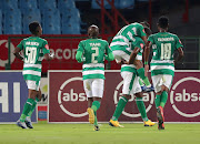 Bloemfontein Celtic captain Ndumiso Mabena celebrates with his teammates after scoring the equalising goal before his Mamelodi Sundowns counterpart Hlompho Kekana scored the winning goal. 