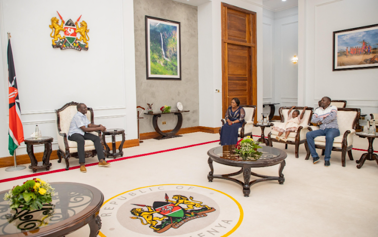 President William Ruto with four-year-old Tinsley Nduta and her parents; Agnes Wairimu and George Ngugi, during a visit to the State House on May 19, 2024.