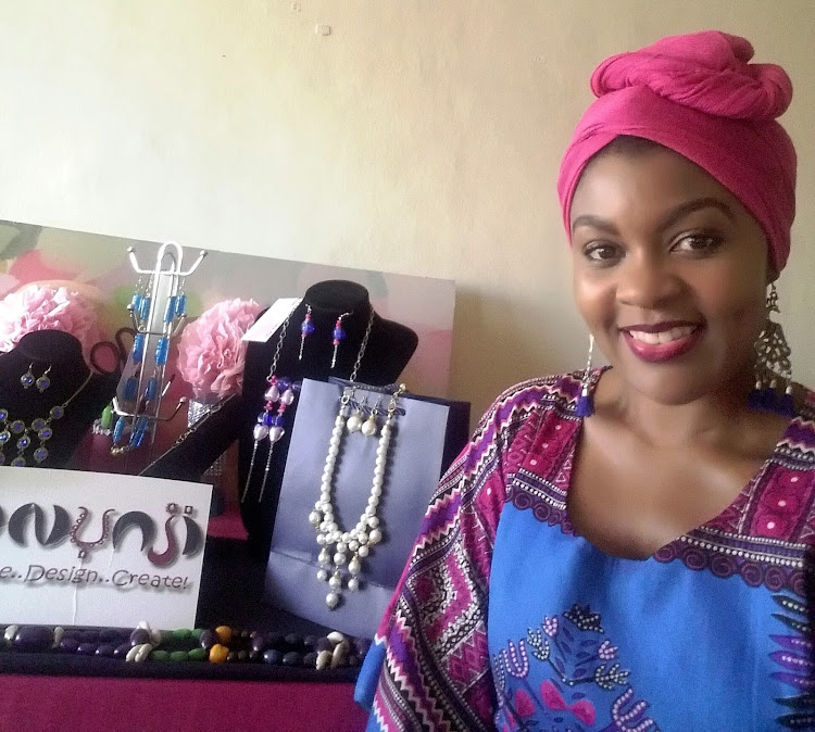 Nnunji founder and creative designer Benadatte Kaggwa at her crafting workstation