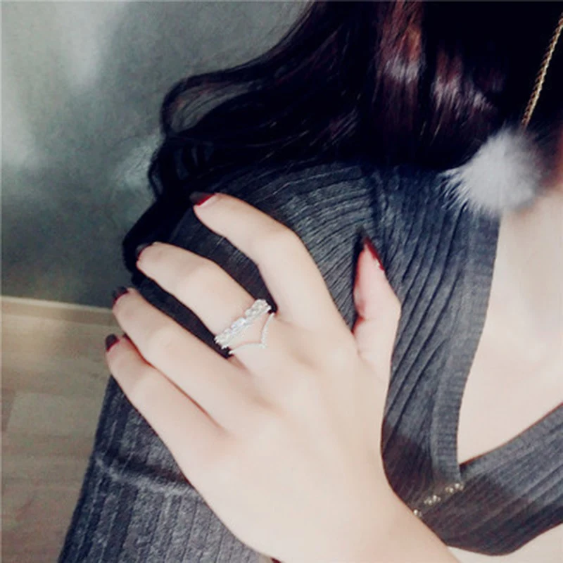 Anillo de doble capa con micro engaste de circonitas