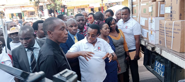 Kiambu governor Kimani Wamatangi accompanied by Kiambu Health executive Dr. Joseph Murega during the flagging off of Sh 60 million medicines from KEMSA to hospitals.