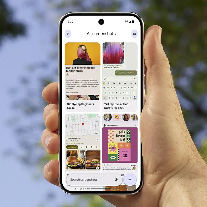 A person's hand holding a Pixel phone, with the Pixel Screenshots app on the screen.