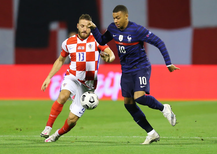 France's Kylian Mbappe in action with Croatia's Nikola Vlasic in the UEFA Nations League A, Group 3 match at Stadion Maksimir, Zagreb on October 14, 2020