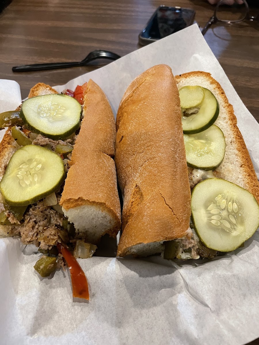 The cheesesteak with grilled onions, grilled peppers snd pickles