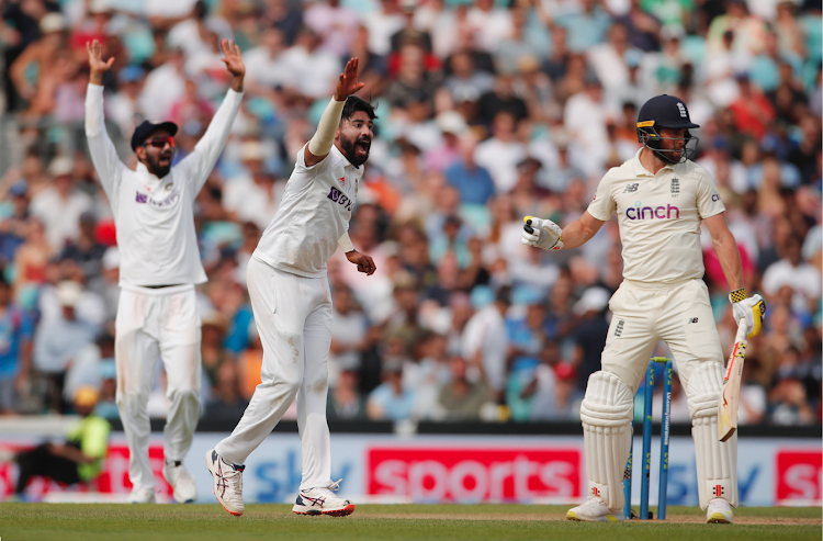 India's Mohammed Siraj appeals for the wicket of England's Chris Woakes.