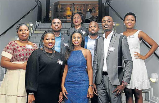 ALL SMILES: Chartered accountants, front from left, Bakhona Bukani, Deneo Mpendu, Sibabalwe Bebeza and Tarisai Takawira and, back from left, is Vuyo Kuzana, Zintle Tshem, Sithembiso Zindela and Tumelo Mahange Picture: SIBONGILE NGALWA