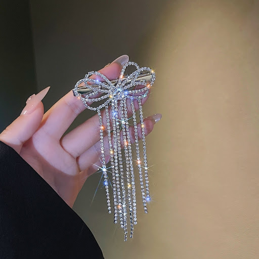 Title 3, Diamond Bow Fringe Hair Clip. Elevate your hair...