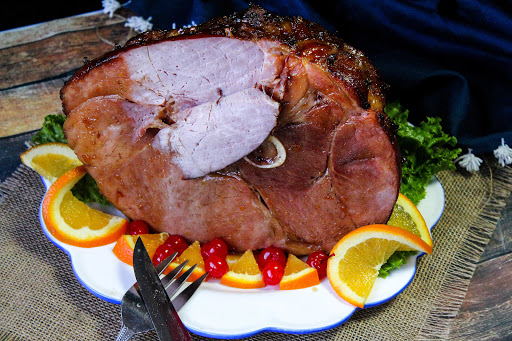 A slice cut off the Bourbon Glazed Ham.