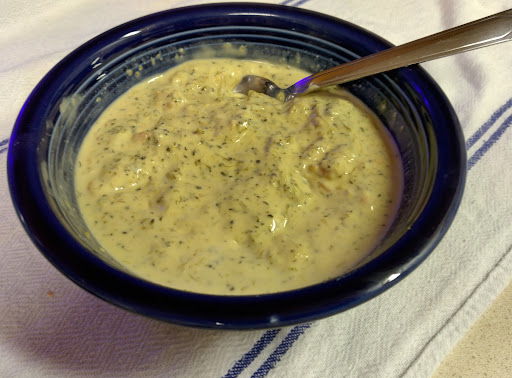 Panera broccoli soup in a bowl and ready to serve.