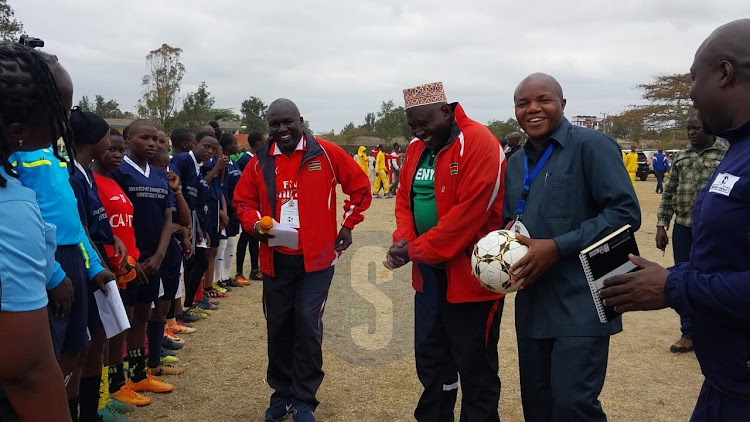 Machakos Deputy Governor Francis Mwangangi (holding ball) flags off the 38th National primary schools ball games championship at TTC in Machakos County on Friday, September 9, 2022.