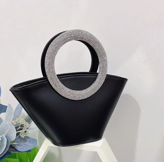 Cesta portátil con asa redonda de diamante. Lleva tus cosas con estilo y comodidad. Perfecta para compras, picnics y más.