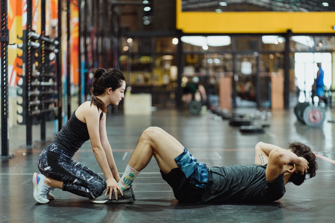 Free A Man Doing Sit Ups Stock Photo