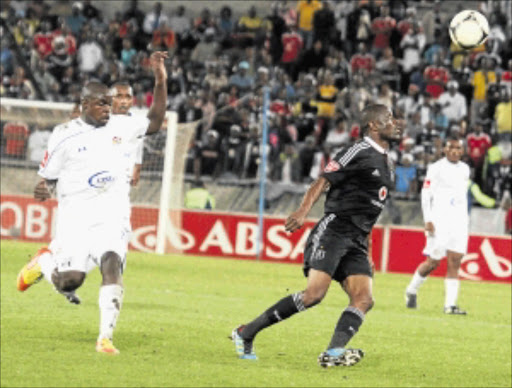 SCORCHER: Orlando Pirates player Lucky Lekgwathi scores the second goal against SuperSport United at Peter Mokaba Stadium last night. PHOTO: ELIJAR MUSHIANA