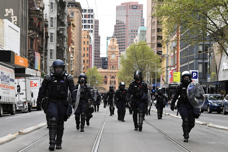 Riot Police respond as protesters rally against construction industry coronavirus disease (Covid-19) mandates in Melbourne, Australia, September 22, 2021.