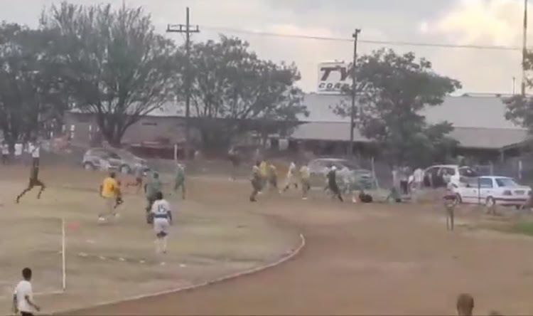 A screenshot of a video shared on social media depicting the violence that broke out in the ABC Motsepe League Northern Cape match between Postmasburg FC and Jacksa Spears at Postmasburg Sports Grounds on Saturday.