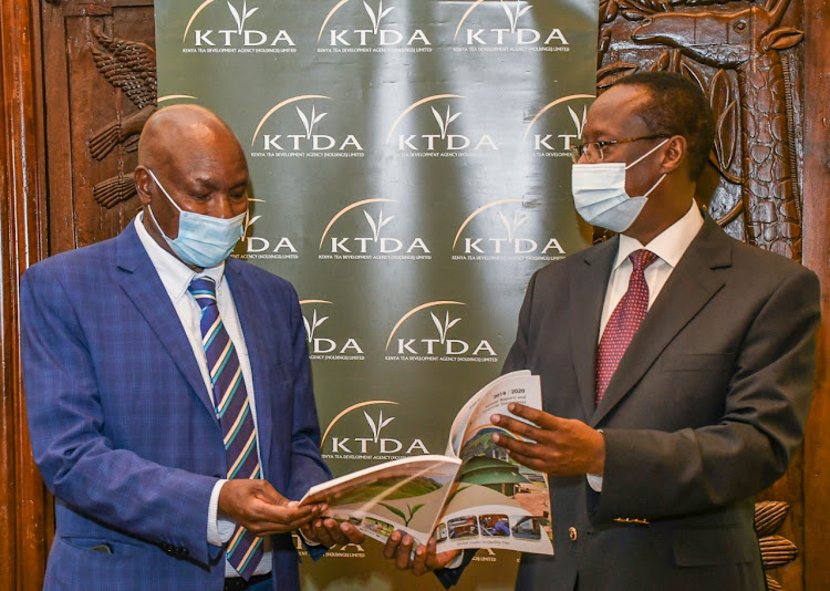 KTDA Holdings Chairman Peter Kanyago with KTDA Holdings Group CEO, Lerionka Tiampati at the company's Annual General Meeting which was held on Friday, Dec 18, 2020 in Nairobi