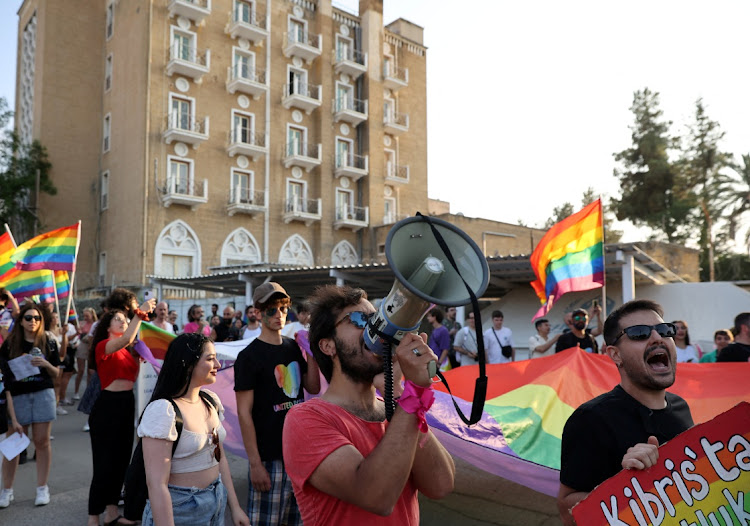 Members of Cyprus's LGBTQ+ communities from both sides attend the annual bi-communal LGBTQ+ Pride at Ledra Palace inside the UN buffer zone in Nicosia, Cyprus, June 17, 2023.