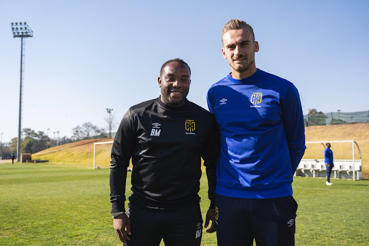 Cape Town City head coach Benni McCarthy pose for a photograph with his newly signed goalkeeper Peter Leeuwenburgh from Ajax Amsterdam at the club's training base on Thursday July 26 2018 in 2018.