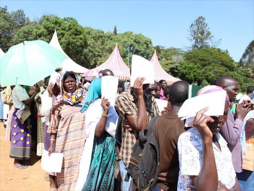 Kibra residents queue to submit bursary forms during the Kibra Constituency Open Bursary vetting day at the DOs grounds