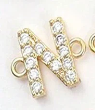 Nouveau bracelet en acier inoxydable avec initiale anglaise Zircon Cuivre 26, personnalisable et élégant, le cadeau idéal.