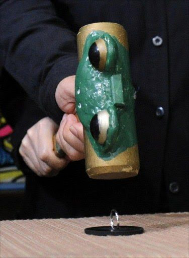 In this file picture a couple smash their wedding rings with a hammer during their divorce ceremony in Tokyo.