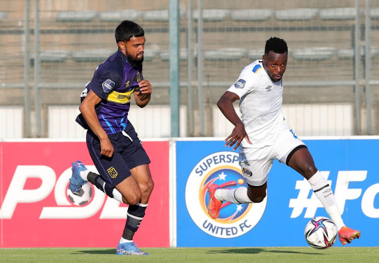 Gamphani Lungu of Supersport United is challenged by Keanu Cupido of Cape Town City during the league match between the two sides at Lucas Moripe Stadium in Pretoria.