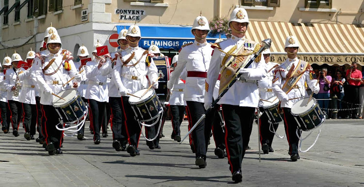 British pageantry on display as the Corps of Drums of the Royal Gibraltar Regiment passes by the Convent.