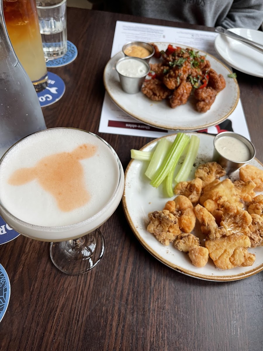 Boneless wings, Buffalo cauliflower and bourbon/lemon/egg crème cocktail