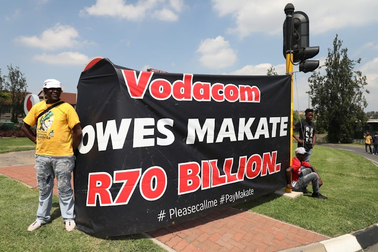 Supporters of the #pleasecallme movement protesting outside the Vodacom Head Office in Midrand calling for Vodacom to pay Please Call Me inventor Nkosana Makate.