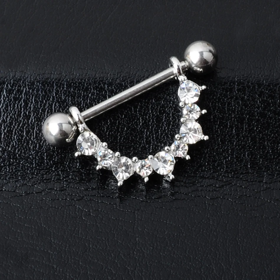 Anneau de téton en forme de U avec diamants, ornement et accessoires. Élégance discrète et éclat pour une expression personnelle audacieuse et sophistiquée.