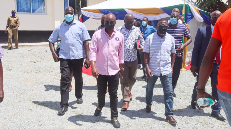 Kilifi Governor Amason Kingi and his deputy Gideon Saburi at the Mariakani subcounty hospital on Wednesday.