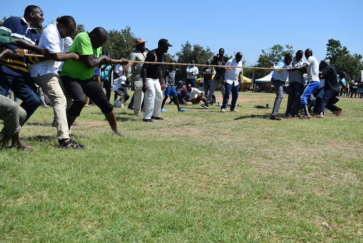 ICT &Digital Economy CS Eliud Owalo participate in a tag of war during Rusinga cultural festival in Suba North on December 24,2023