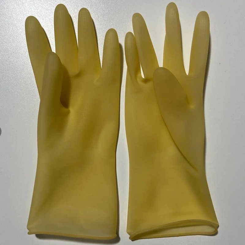 Luvas de silicone impermeáveis antiderrapantes para lavar louça na cozinha, proporcionando limpeza segura e eficiente.