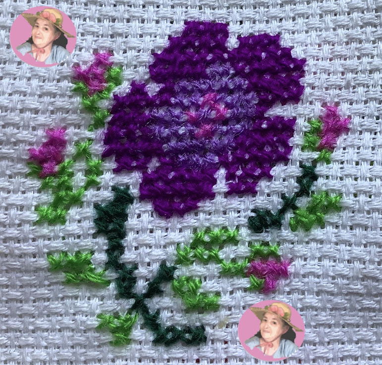 Beautiful flower in  cross stitch 