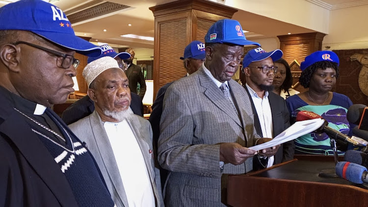 Azimio Presidential running mate selection committee Chairman Noah Wekesa flanked with other committee members during a press briefing in Nairobi on May12,2022.Photos/Enos Teche