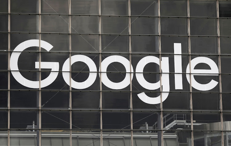 FILE PHOTO: The logo of Google is seen on a building at La Defense business and financial district in Courbevoie near Paris, France, in this September 1 2020 file photo. Picture: REUTERS/CHARLES PLATIAU