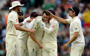 England players celebrate after taking a wicket against South Africa at The Oval in London on Friday 28 July 2017. 