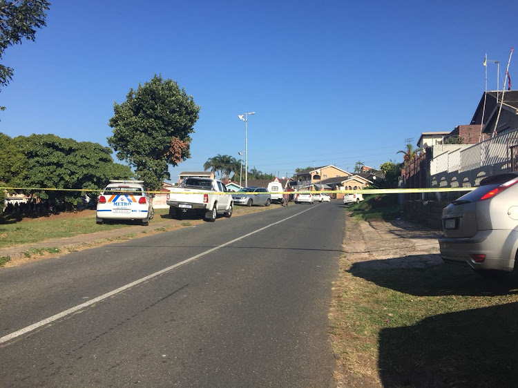 Police have cordoned off the road on which the shooting took place.