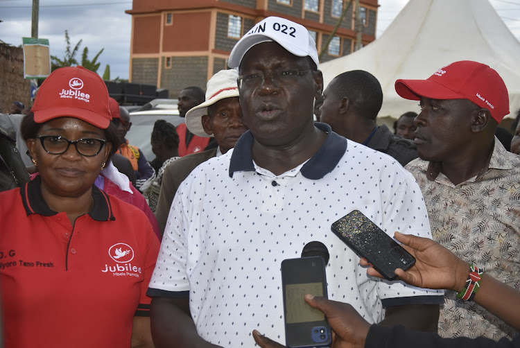 Governor James Nyoro after issuing title deeds to Umoja slums residents in Thika on Tuesday. He disclosed that 50,000 title deeds will be issued to informal settlement dwellers within the county.