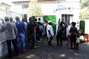 Frustrated Nigerian nationals wait outside the Nigerian Consulate to register their names to be repatriated home. Hundreds ran to the consulate in Illovo, Joburg following a wave of violence across Gauteng in recent weeks.