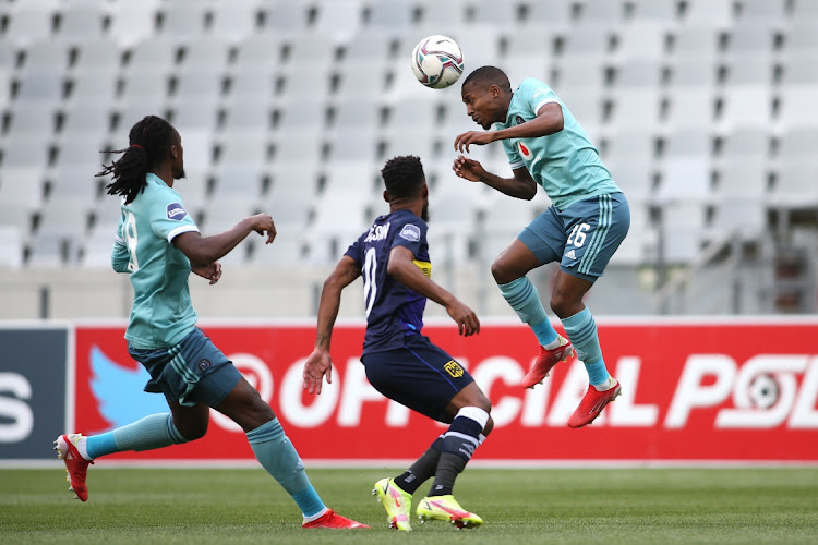 Bandile Shandu of Orlando Pirates hads the ball clear during the DStv Premiership 2021/22 match between Cape Town City and Orlando Pirates held at Cape Town Stadium in Cape Town.