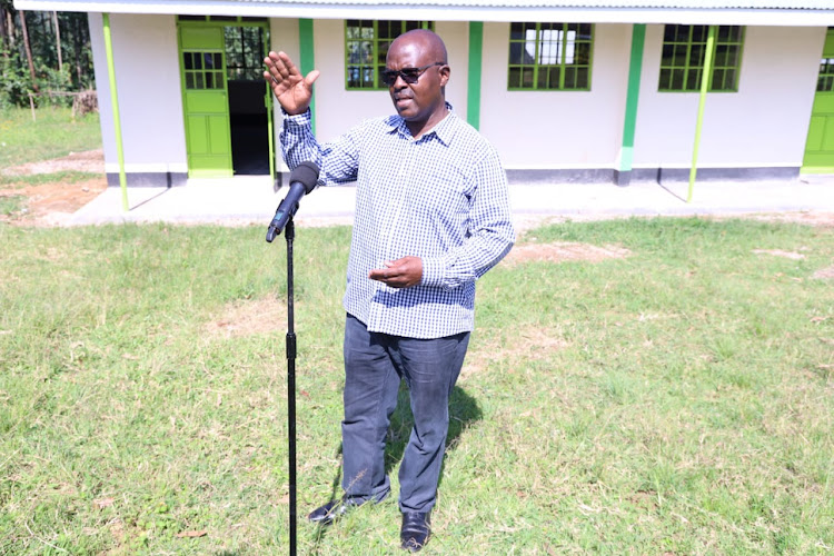 Collins Matemba, the Kakamega county executive for Transport, Infrastructure, Public Works and Energy at Ivonda PAG Primary School on Monday.