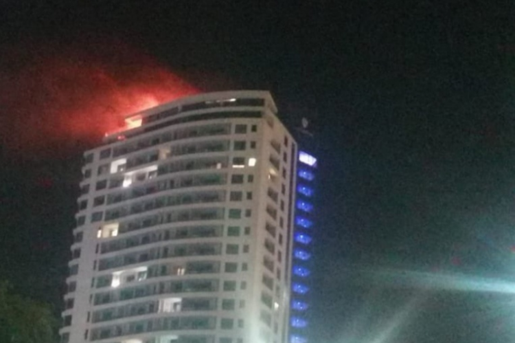 The balcony of the penthouse at the plush Pearl Sky caught alight early on Monday morning.