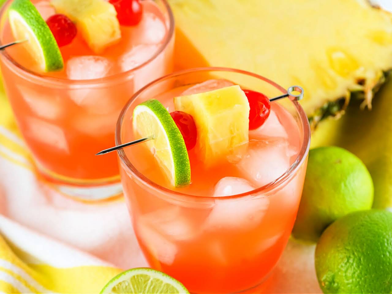 Tropical Rum Punch Recipe - Luau Party Ideas - Living Locurto