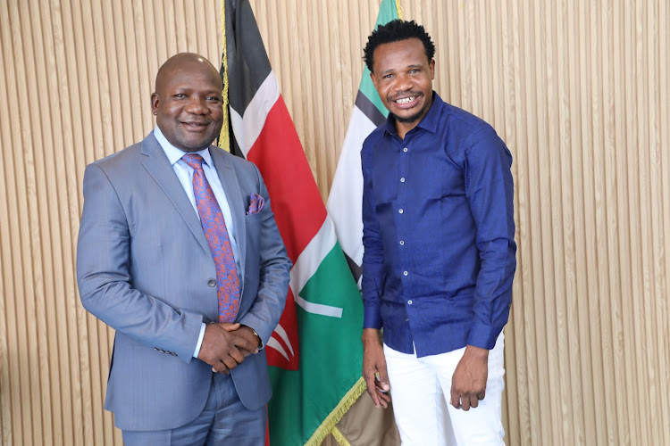 Kakamega Governor Fernandes Barasa and Mumias East MP Peter Salasya after their meeting on Monday.