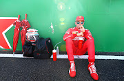 Charles Leclerc of Monaco and Ferrari prepares to drive on the grid before the F1 Grand Prix of Japan at Suzuka Circuit on October 13 2019.