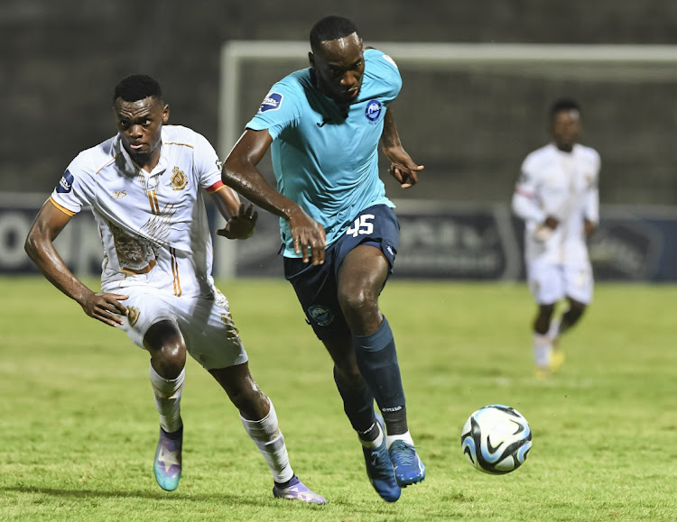 Somila Ntsundwana of Richards Bay and Khulekani Shezi of Royal AM during the DStv Premiership match on Saturday.