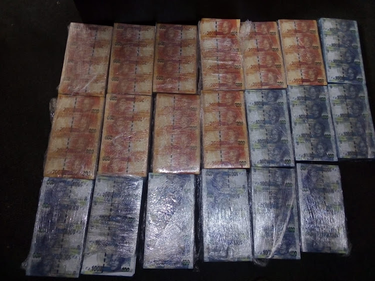 Police arrested a man for possession of of more than R2m in counterfeit money.