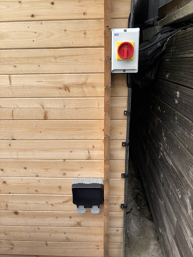 Hot tub isolation switch and outdoor socket install. 